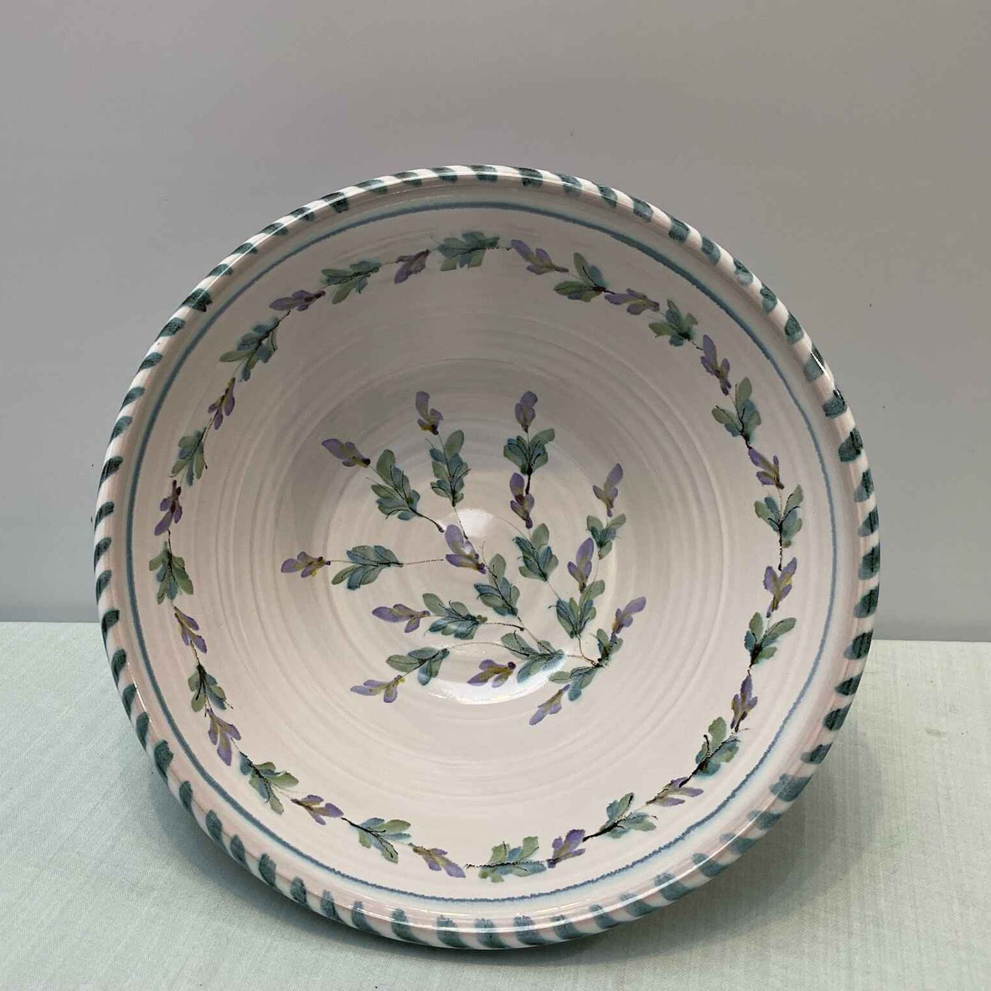 Ceramic bowl with floral pattern on a white background